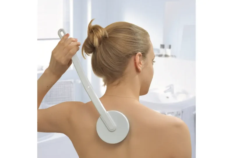 Pripomoček za masiranje in aplikator losjona